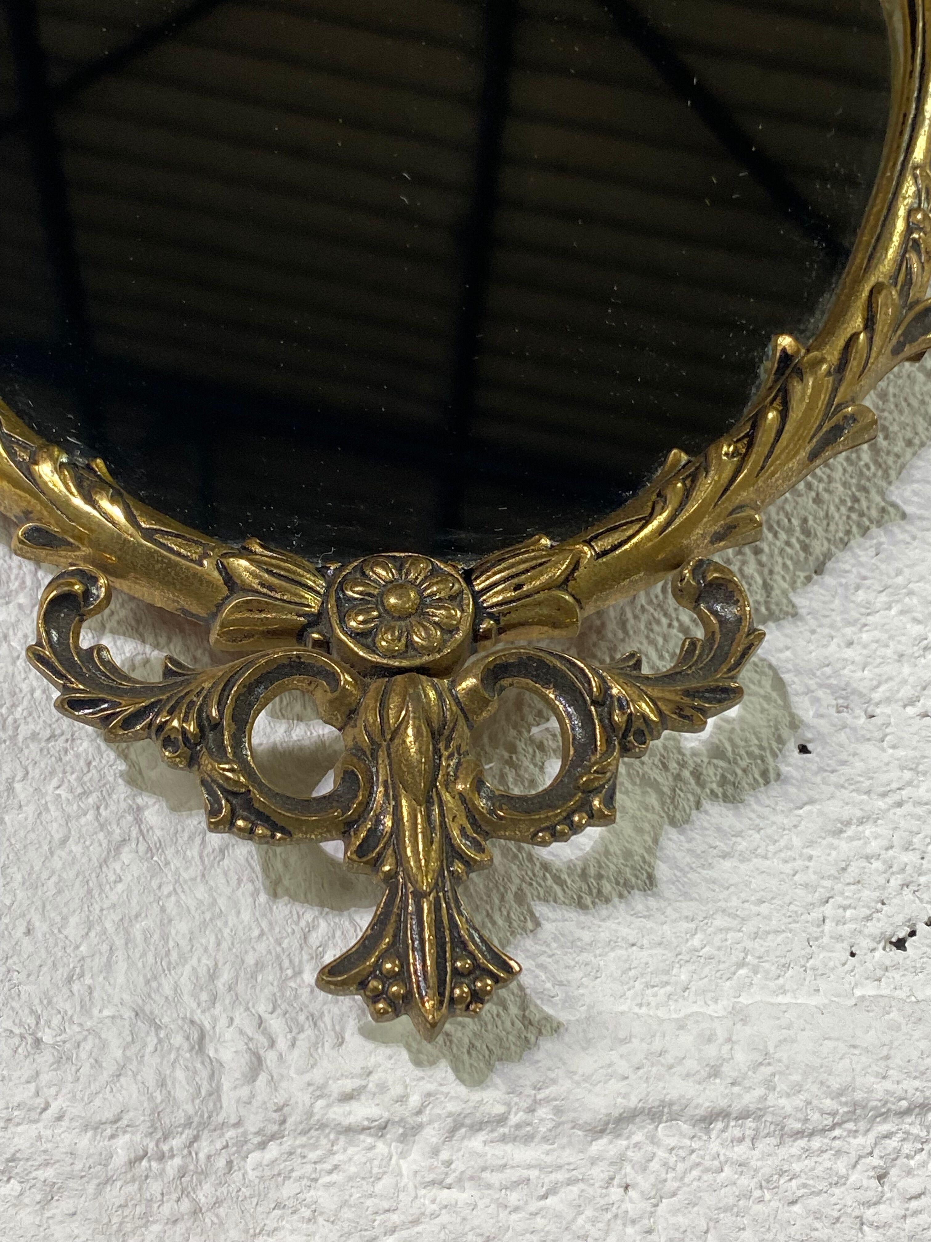 Oval gilded mirror