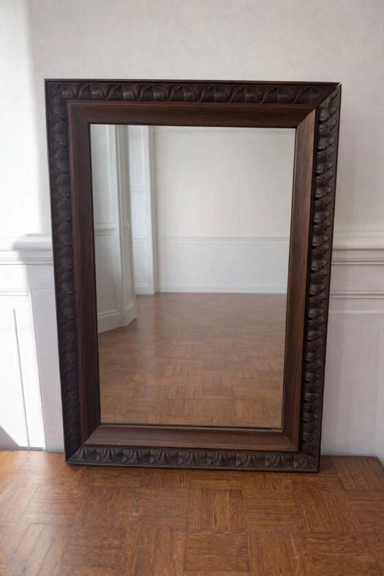 Antique carved wooden mirror