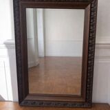 Antique carved wooden mirror