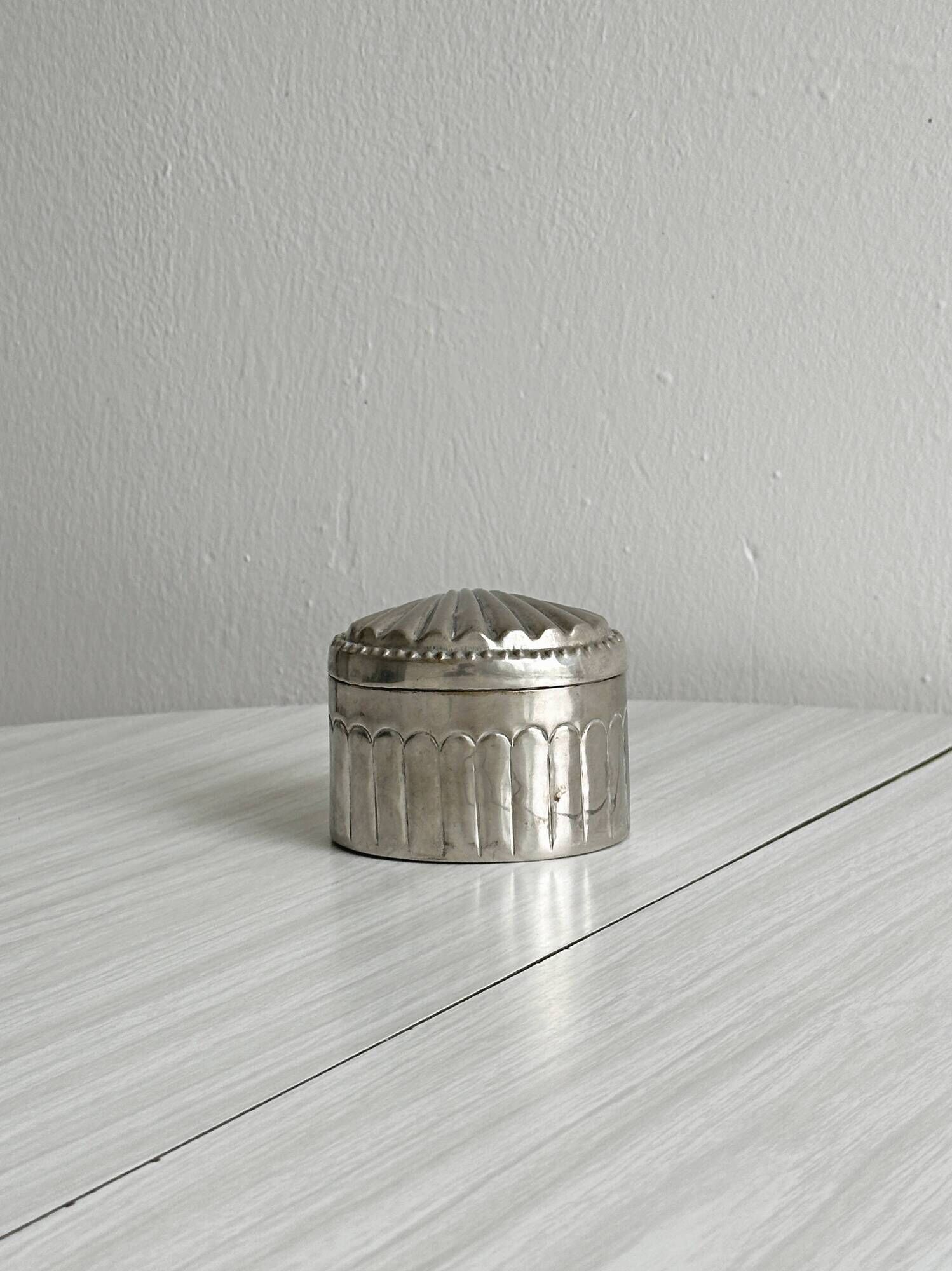 Silver-plated metal catchall with patina