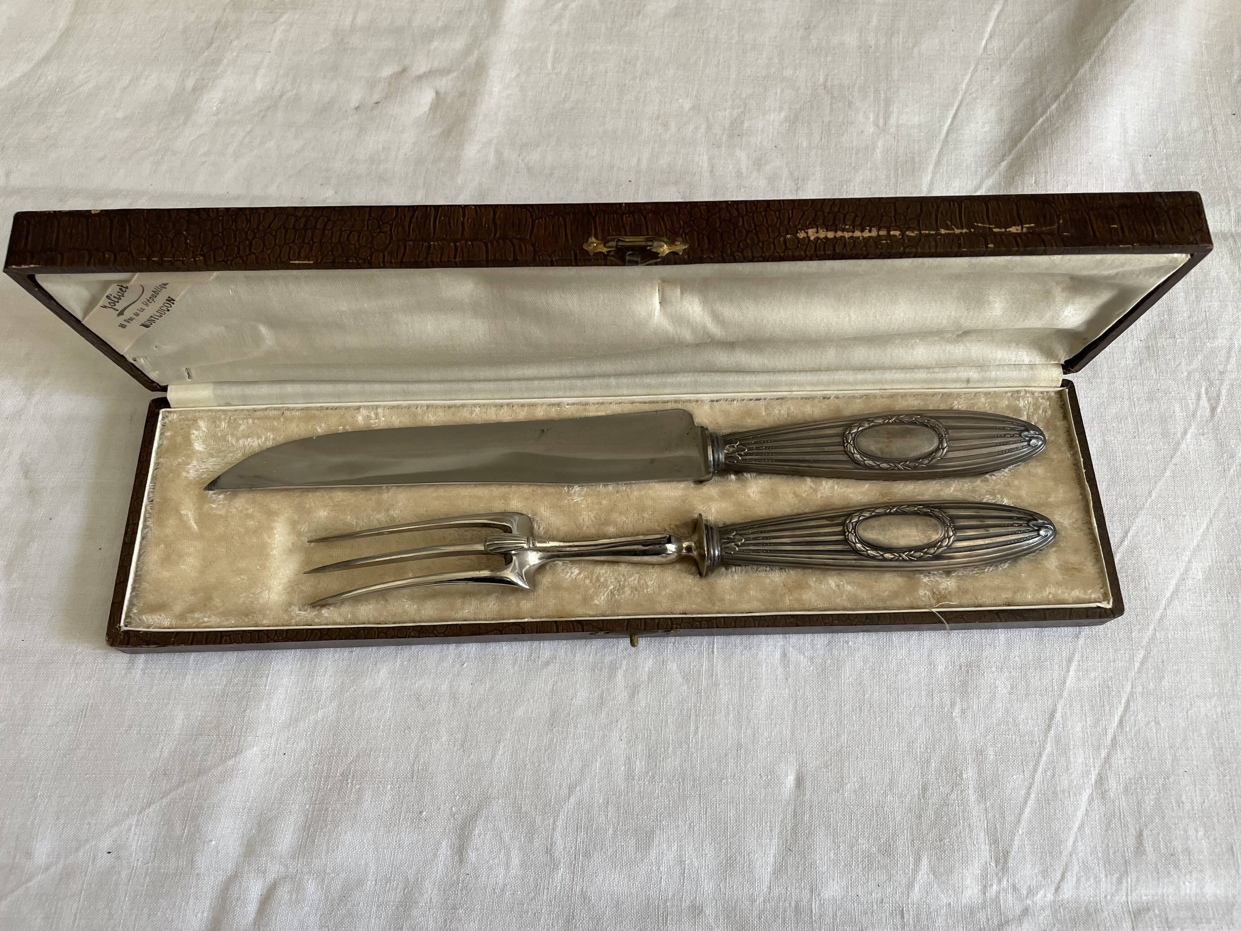 Service of silver leg cutlery in their case