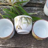 Vintage tea service in ceramic and rattan