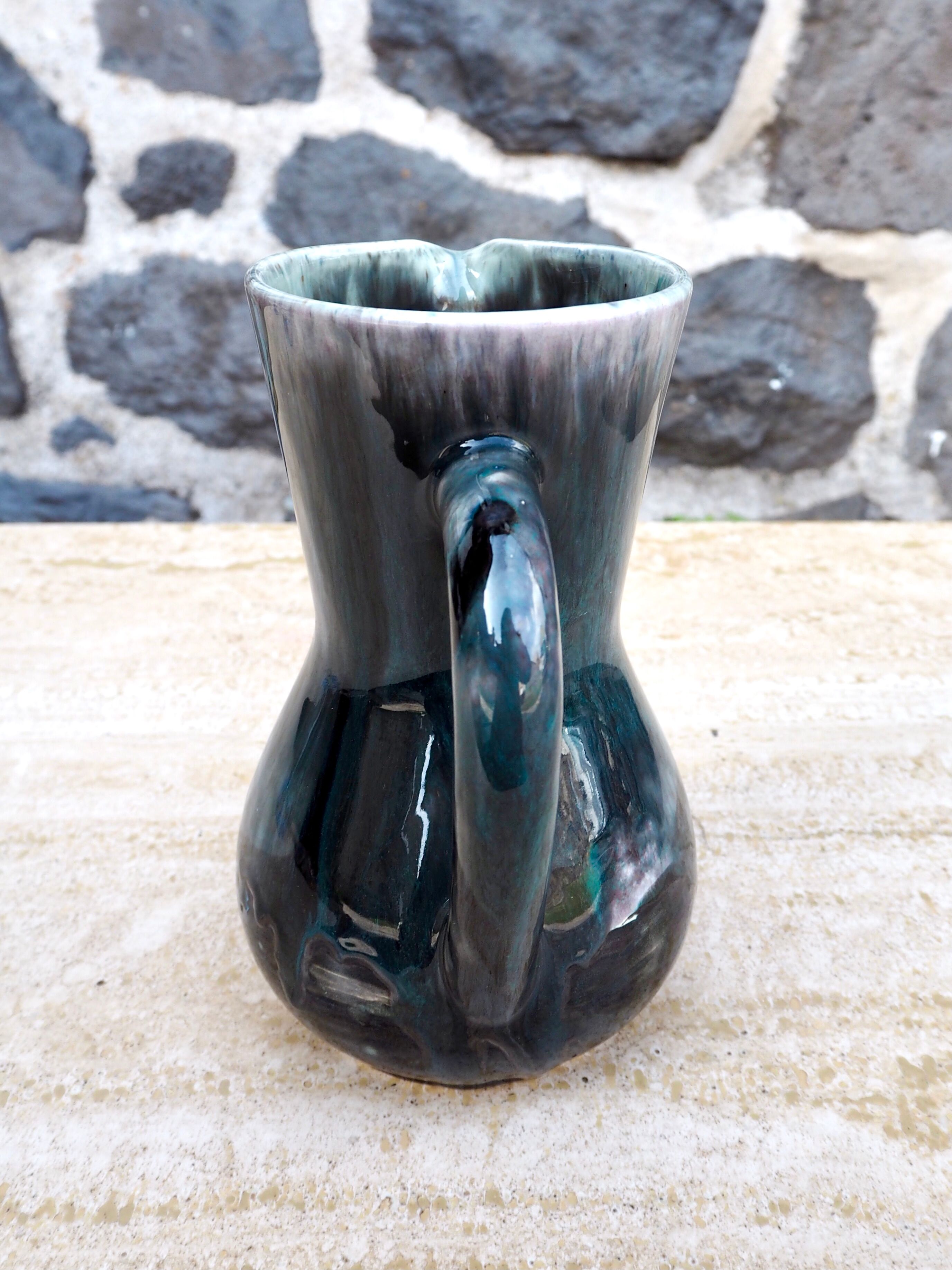 Enamelled ceramic pitcher signed Morvan