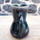 Enamelled ceramic pitcher signed Morvan