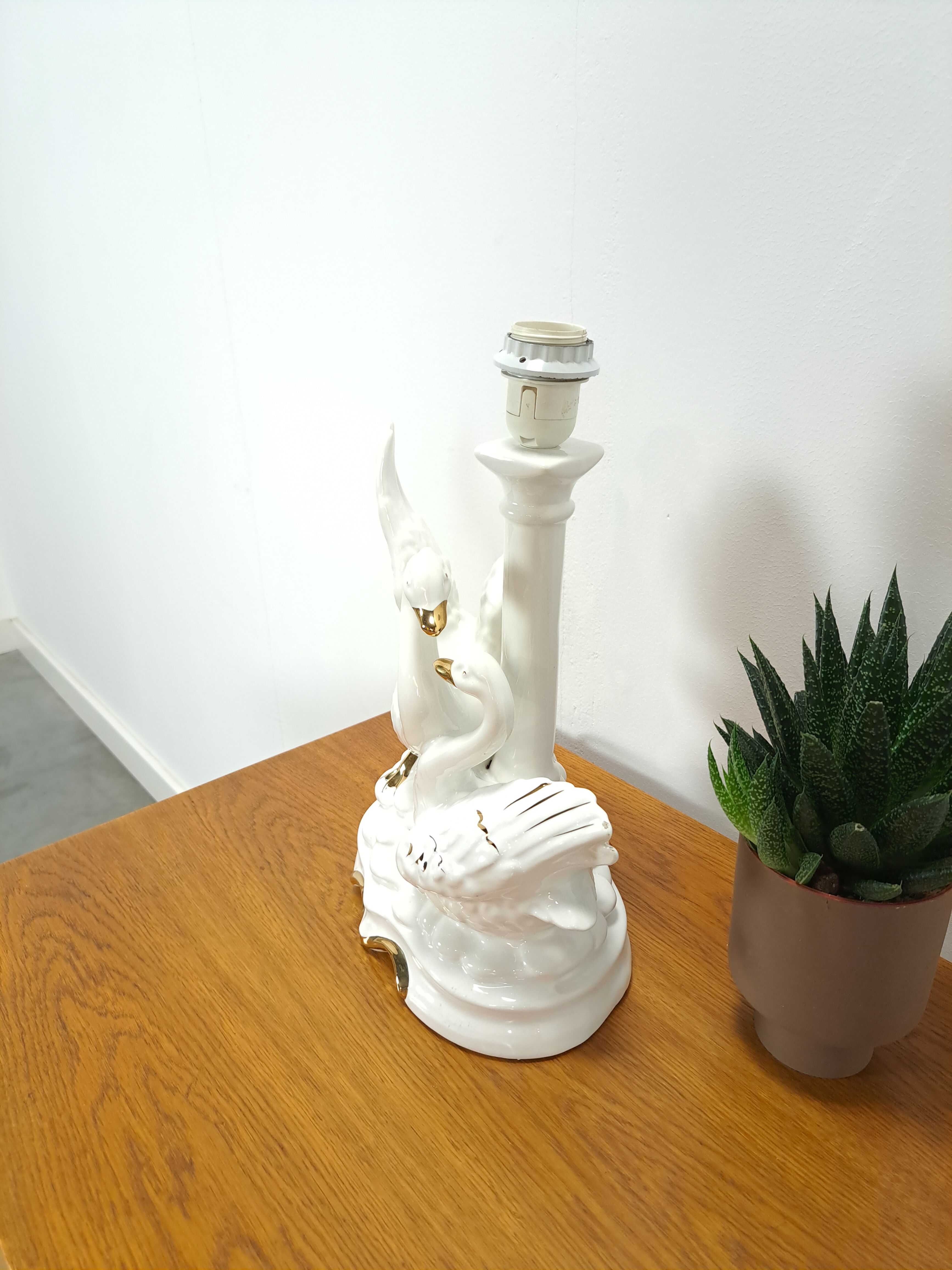 Porcelain lamp swans with vintage gold details