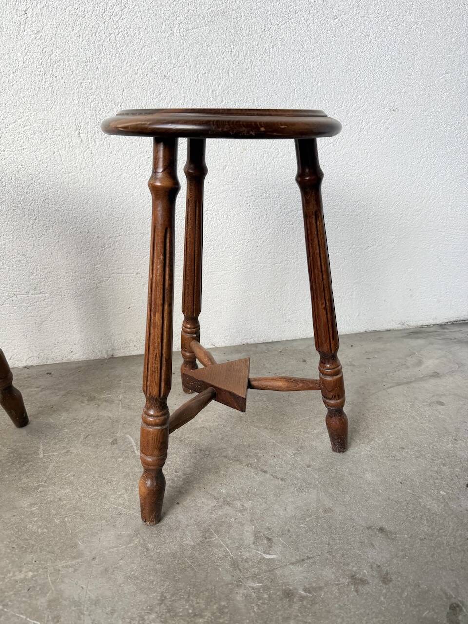 Set of 4 turned oak stools.
