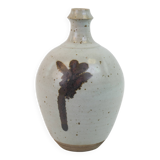 Stoneware bottle with abstract plant motif signed Herbes Folles