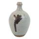 Stoneware bottle with abstract plant motif signed Herbes Folles