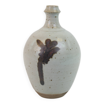 Stoneware bottle with abstract plant motif signed Herbes Folles