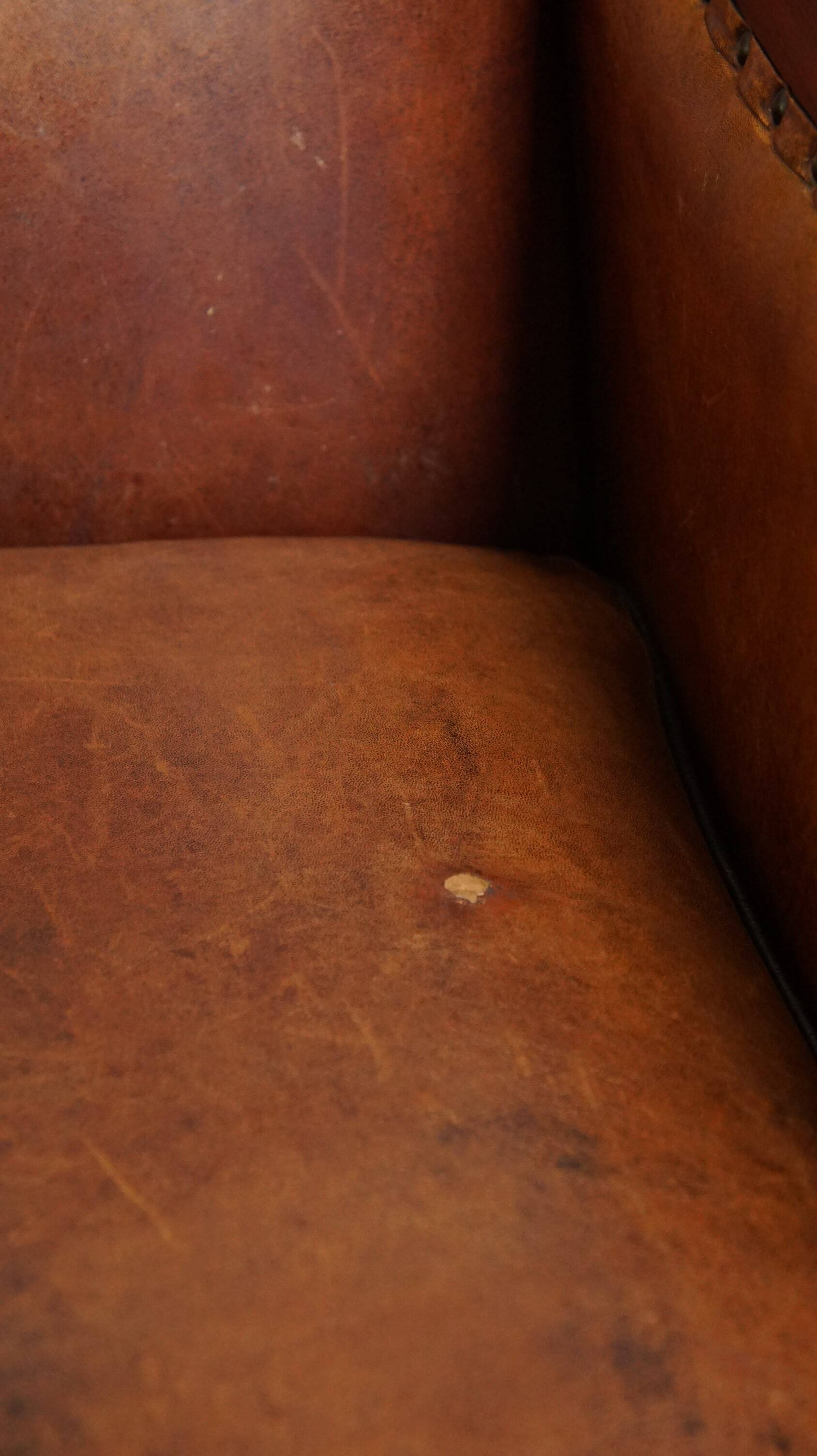 Unique, stately, comfortable sheepskin Art Deco design armchair