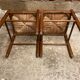 Pair of vintage wooden stools with woven straw seats