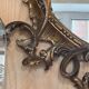 Large gilded wooden mirror, richly carved with winged dragons, 19th century