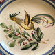 Assiette en céramique à décor d’oiseau