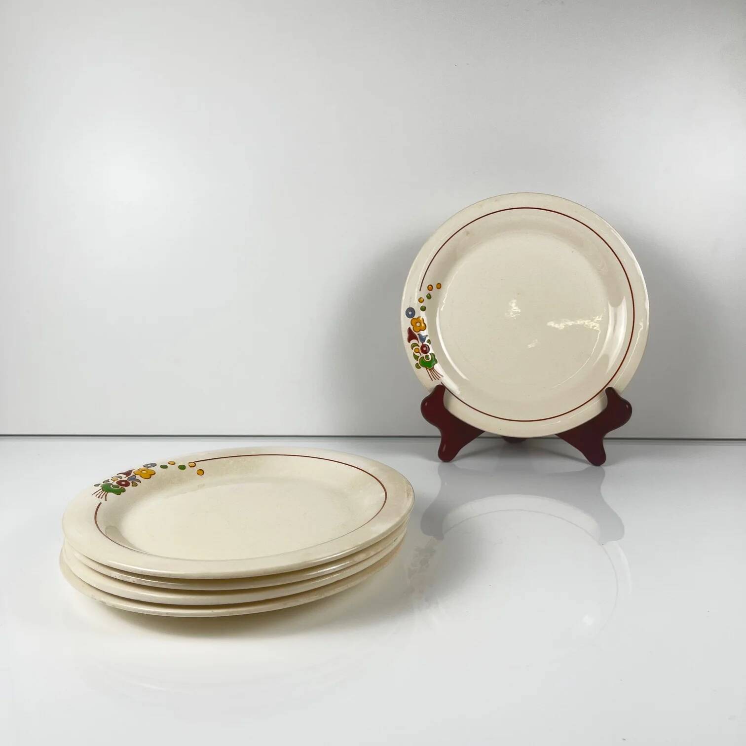 Set of 5 dessert plates Longwy, early 20th century, floral decoration.
