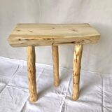 Wooden tripod farm stool