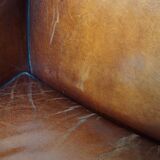 Sheepskin Art Deco design armchair with wood and beautiful cognac-colored leather