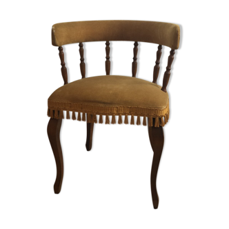 Vintage fringed gondola armchair