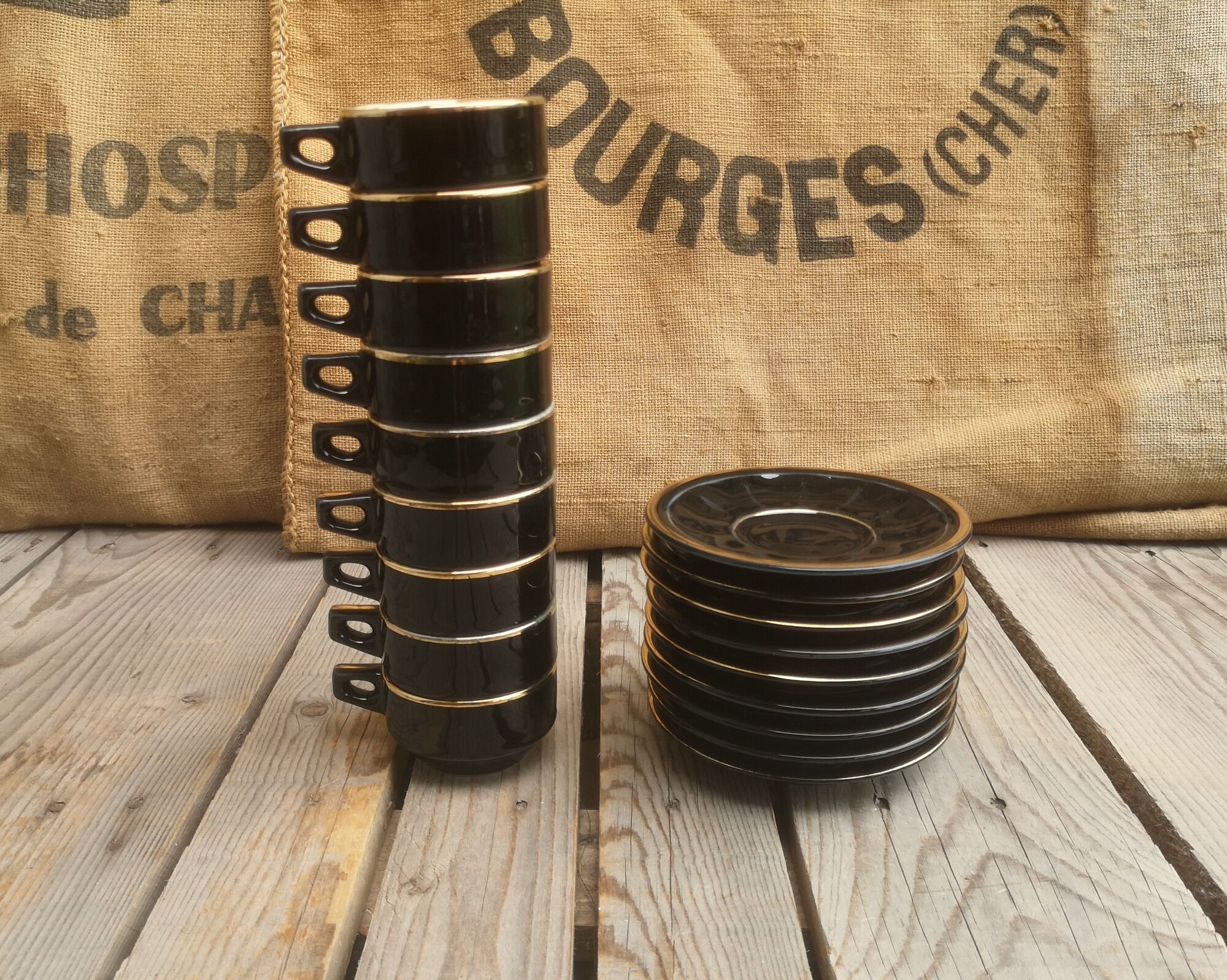 Set of 9 cups and sub-cups in black ceramic and colored gold border