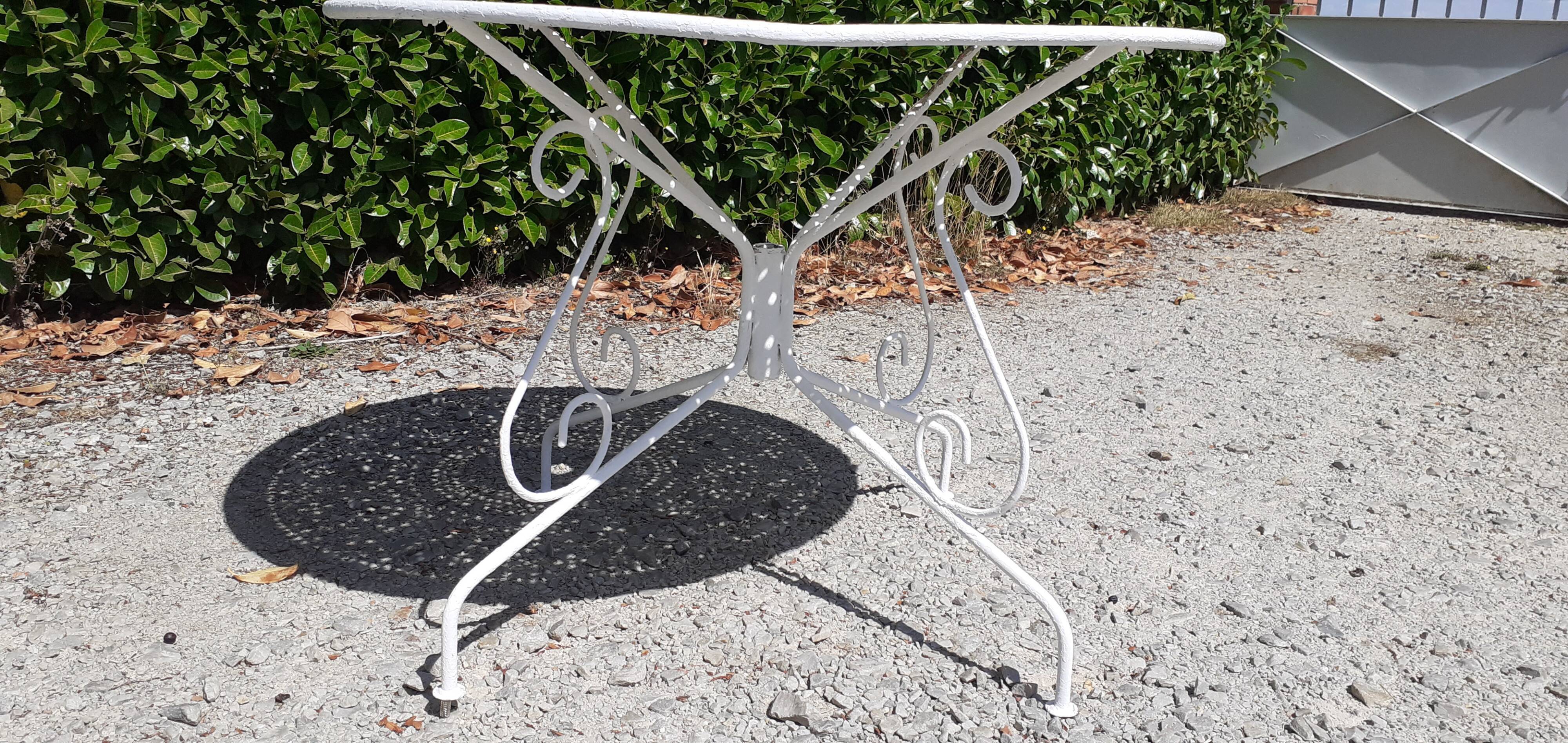 Old white wrought iron garden set