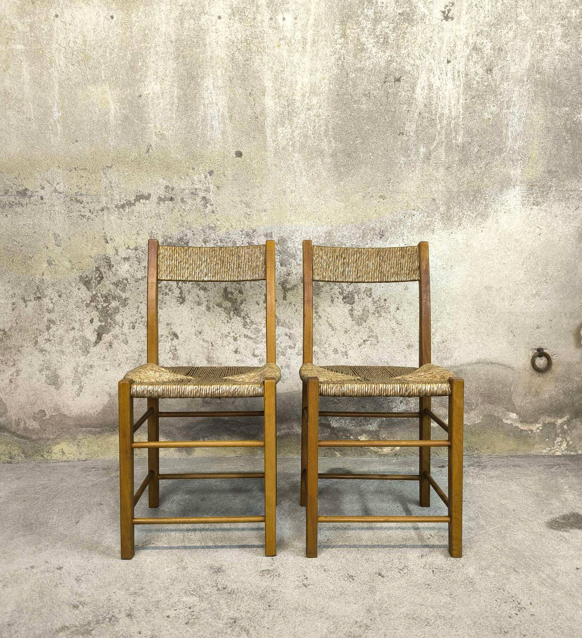Pair of vintage wood and straw chairs