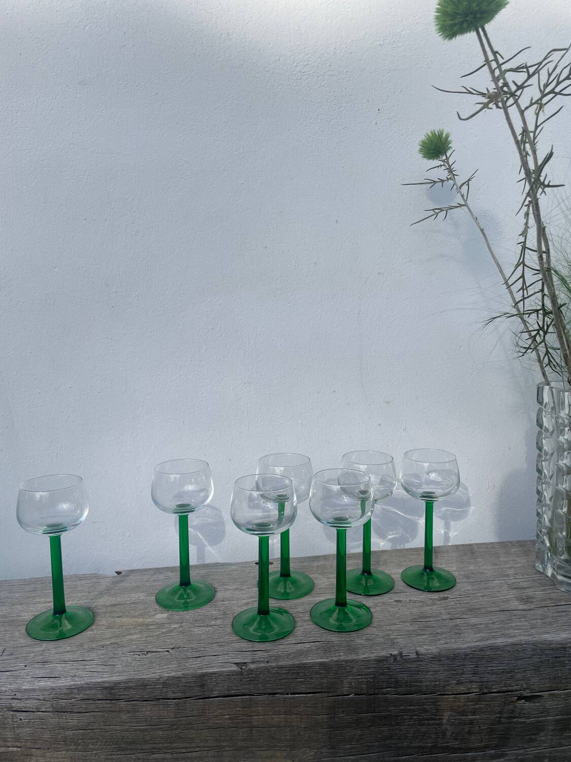 7 green glass stemmed glasses