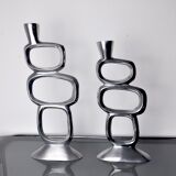 Pair of circle candlesticks by matthew hilton, england, 1980