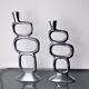 Pair of circle candlesticks by matthew hilton, england, 1980