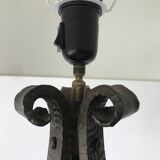 Lampadaire fer forgé art déco à décor de fleurs, vers 1930.