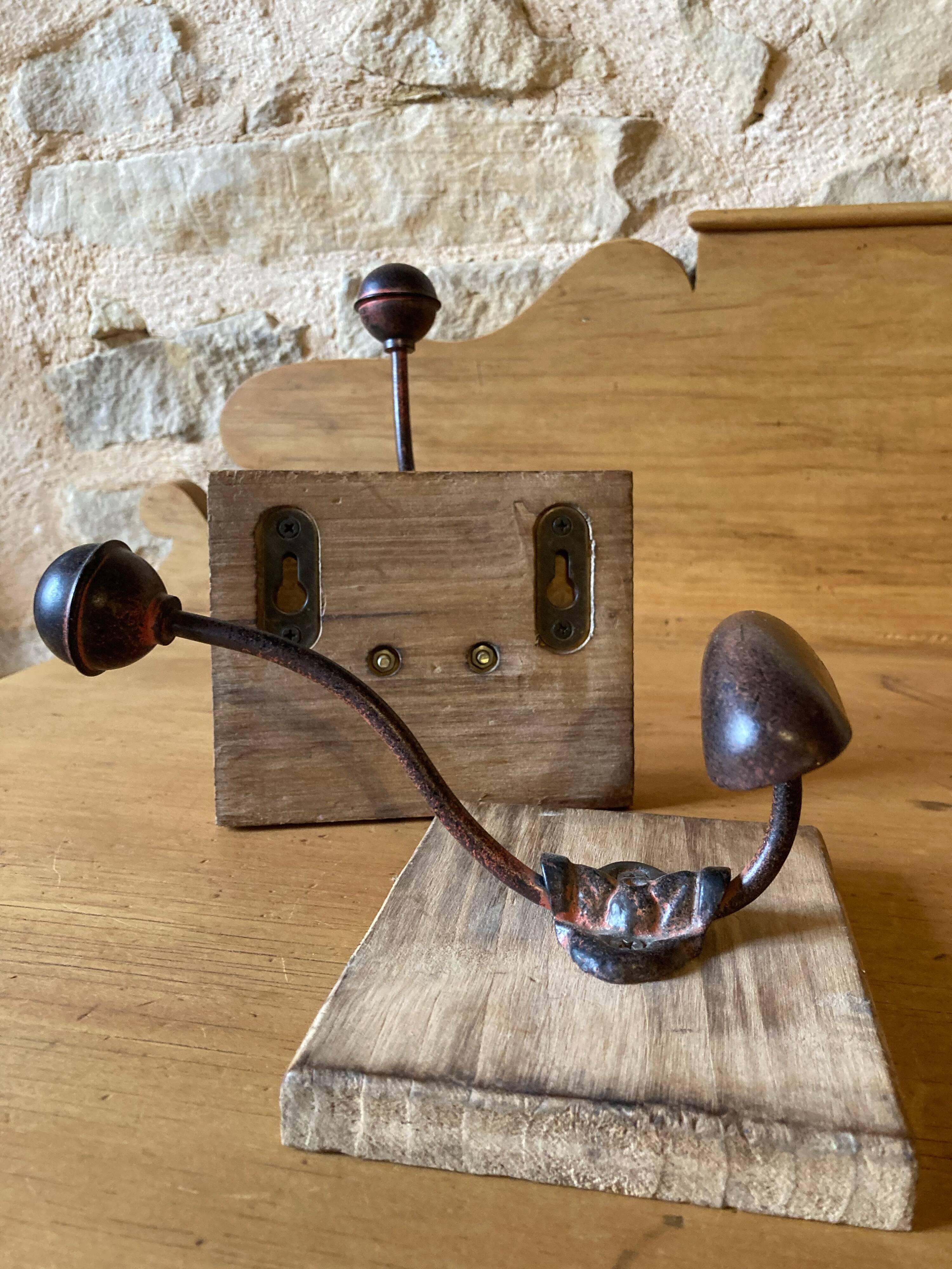 Wooden and metal coat hooks