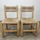2 straw and wood chairs in brutalist style