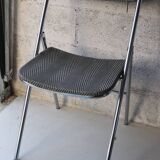 Vintage folding chair in chrome metal and chevron fabric.