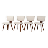 Ensemble de quatre chaises scandinaves en laine bouclée.