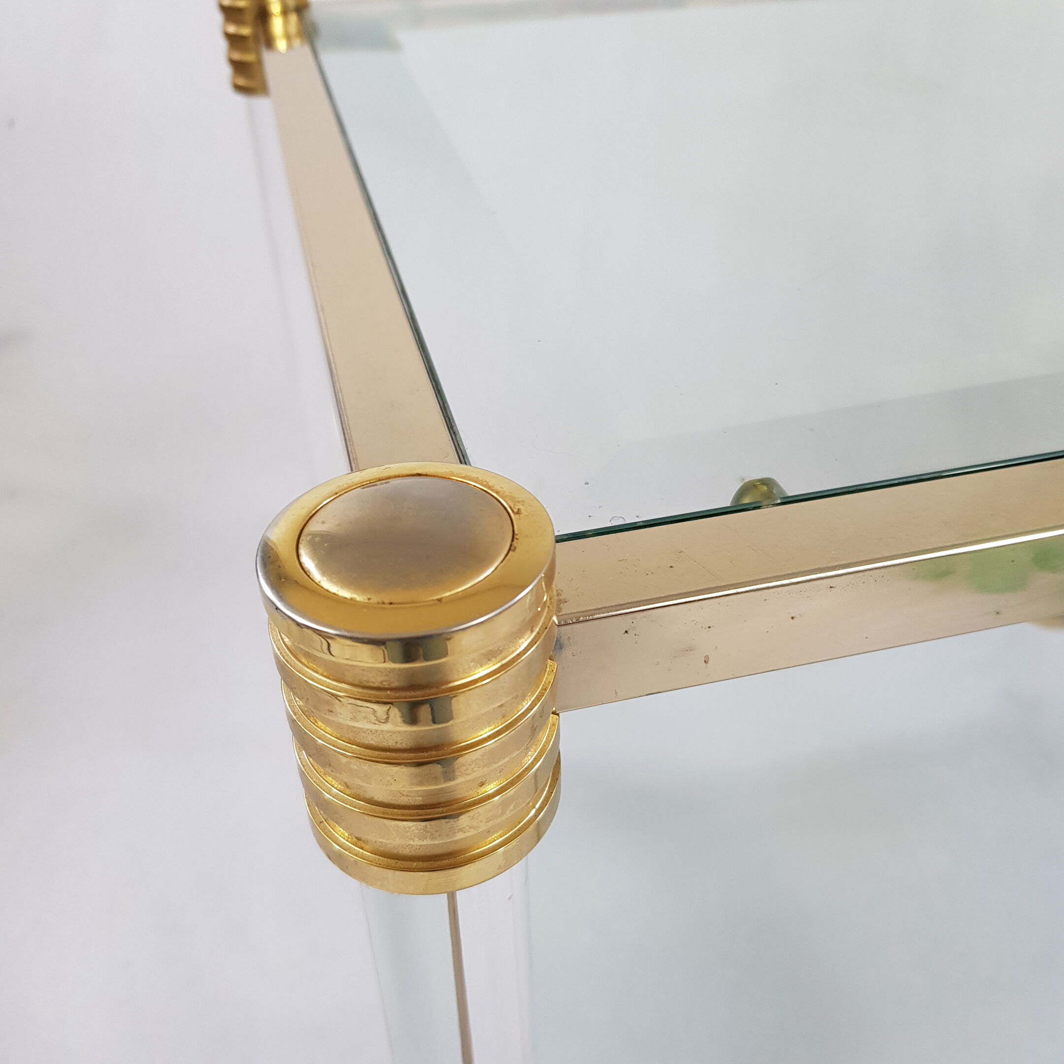 Coffee table in Lucite and Golden steel