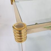 Table basse en lucite et acier doré