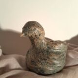 Signed bird sculpture