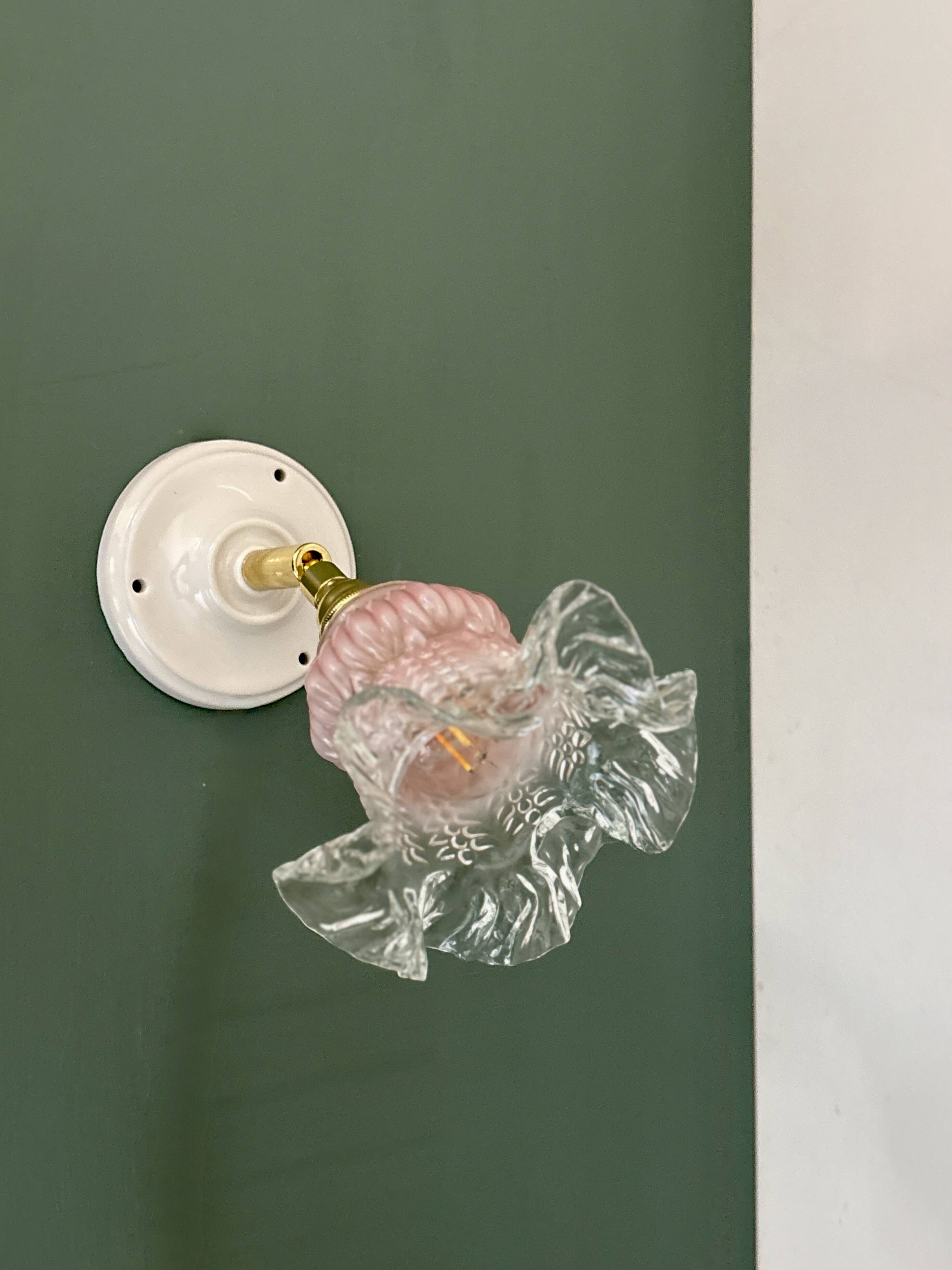 Vintage pink and clear glass tulip wall light.