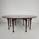 Antique English drop-leaf dining table – Victorian – 8 legs – oval shape – seats 8