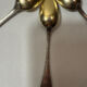 Six Christofle teaspoons, silver-plated vermeil