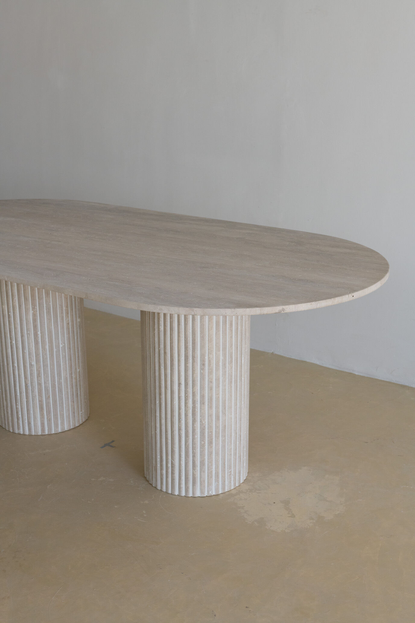 Olya oblong dining table 150x90 in natural travertine