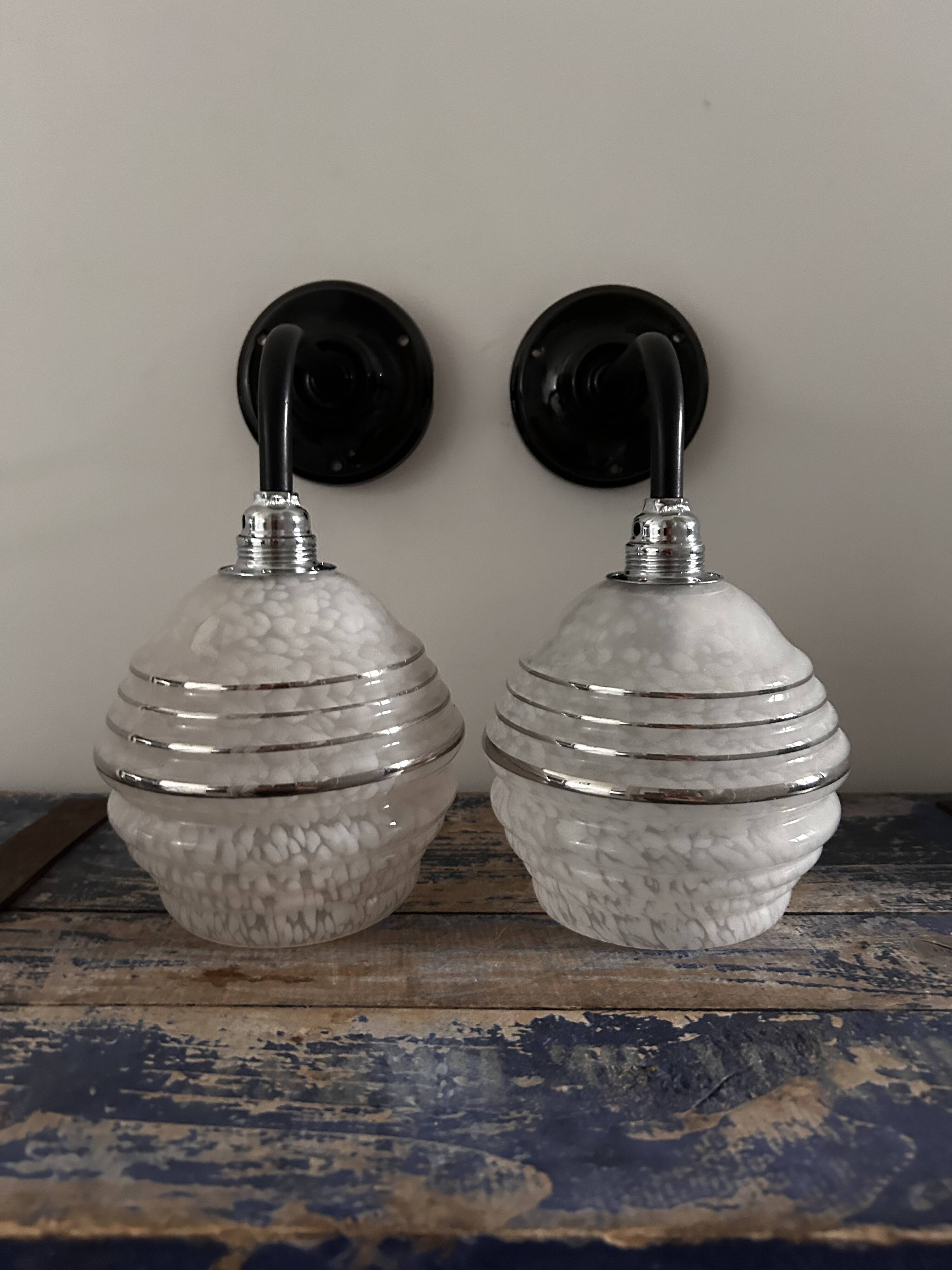 Pair of white, black and silver Art Deco wall lights