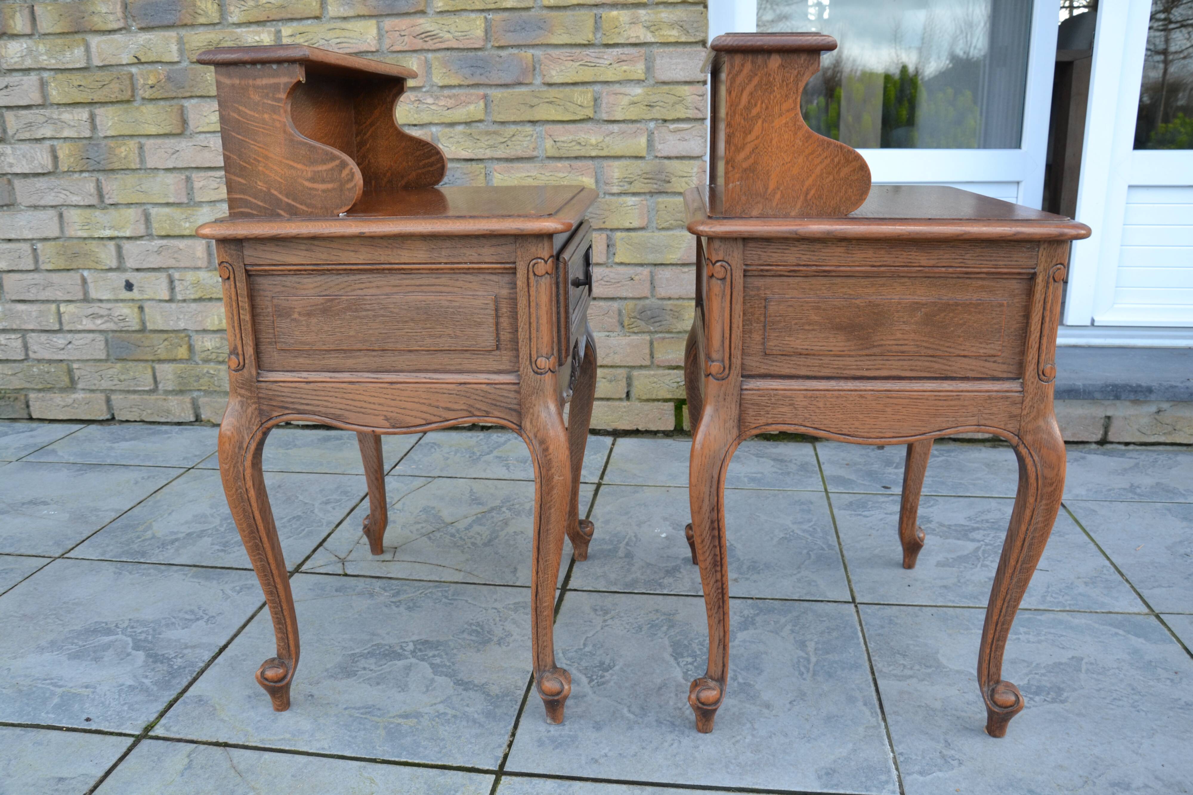 Two oak bedside tables.