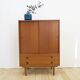 High teak cabinet with sliding doors, 1960s