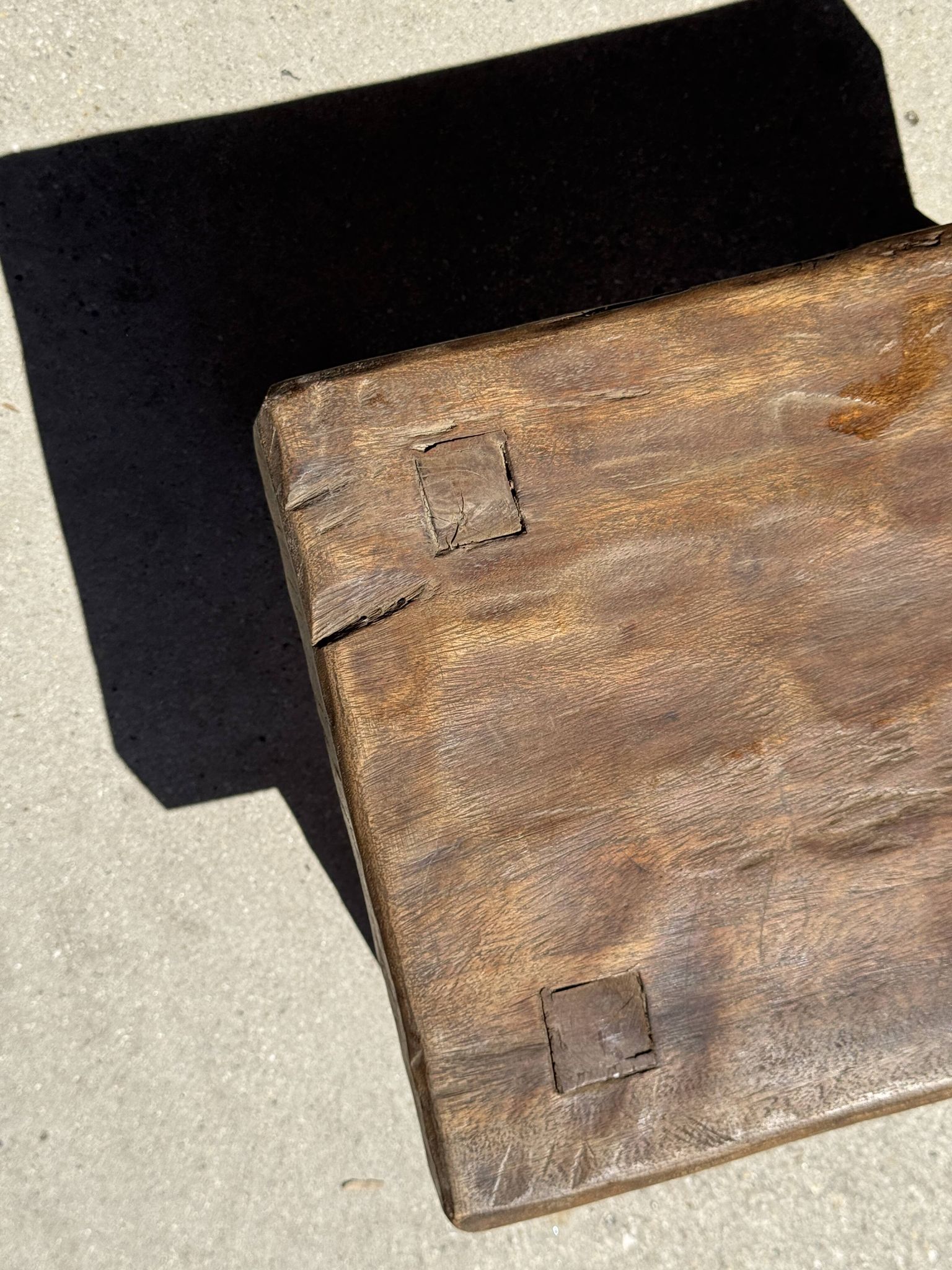 Small stool, rectangular solid teak side table with curved legs.