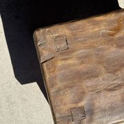 Small stool, rectangular solid teak side table with curved legs.