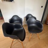 Eames plastic armchairs