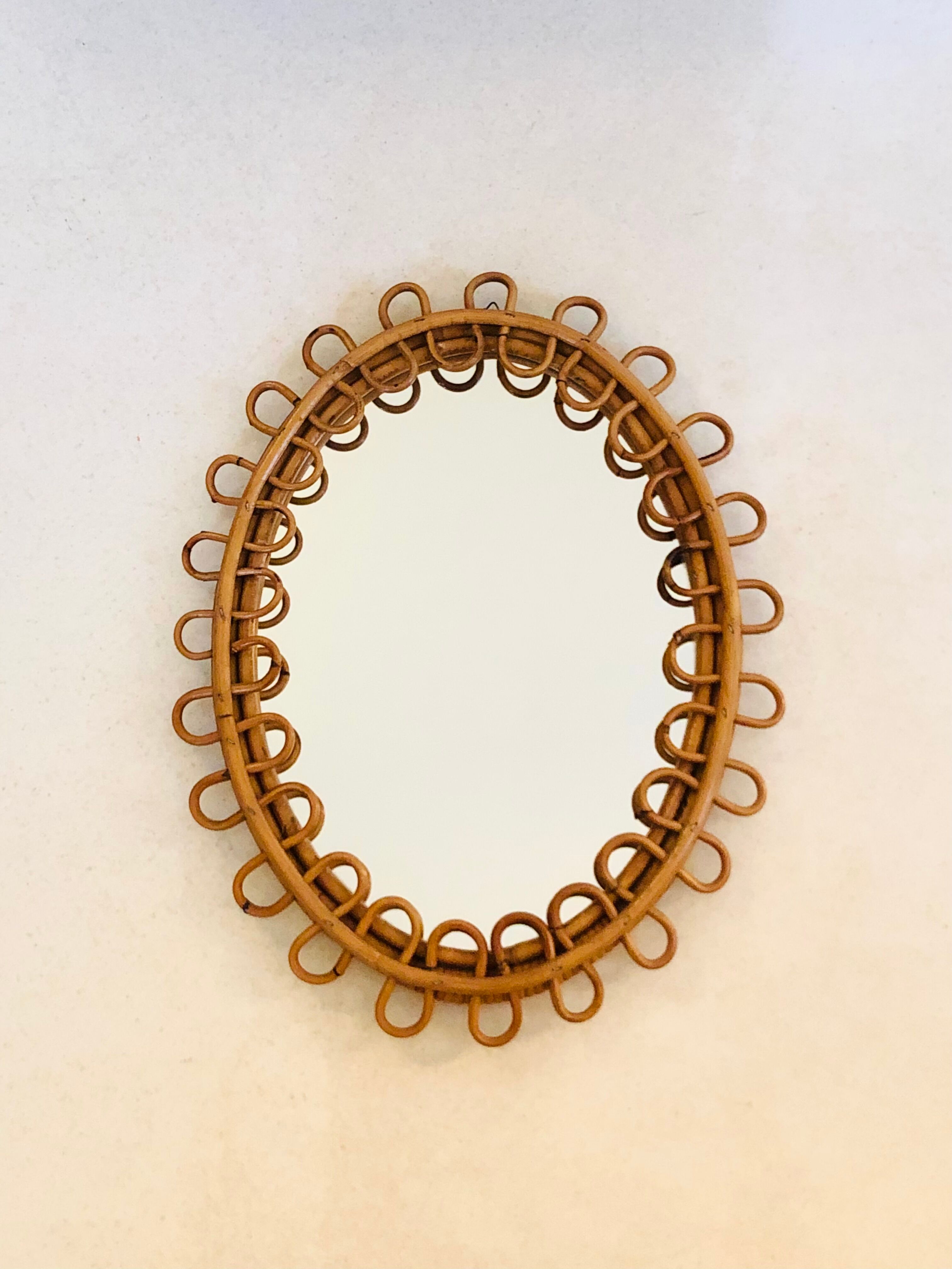 Medium size rattan mirror, Italy 60s