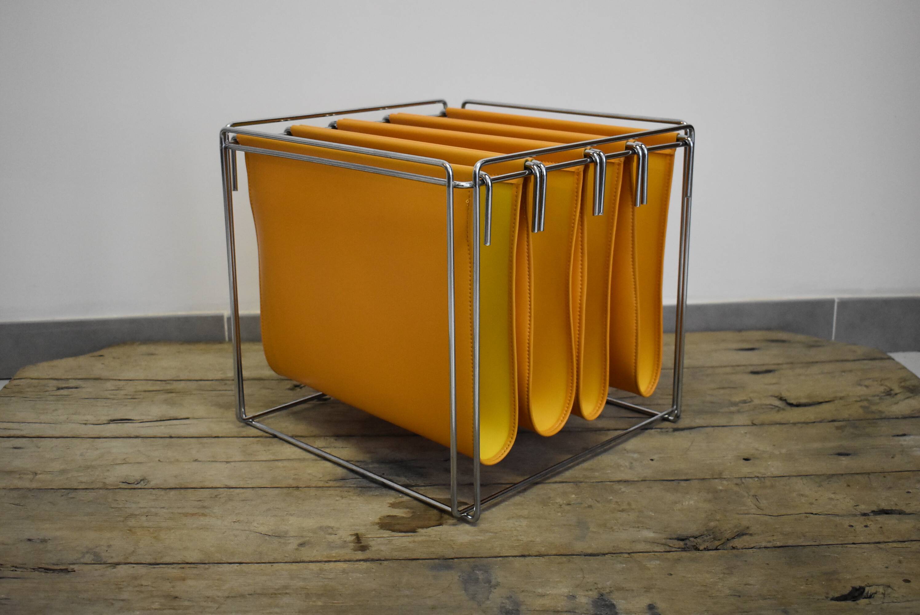 70s Orange magazine holder by Max Sauzé