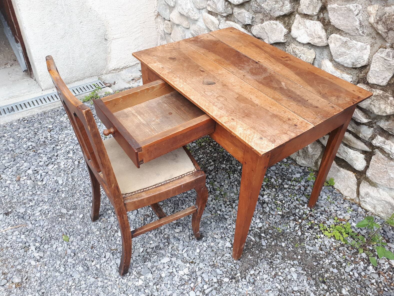 Antique walnut table and chair.