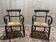 Pair of rustic straw-seated armchairs