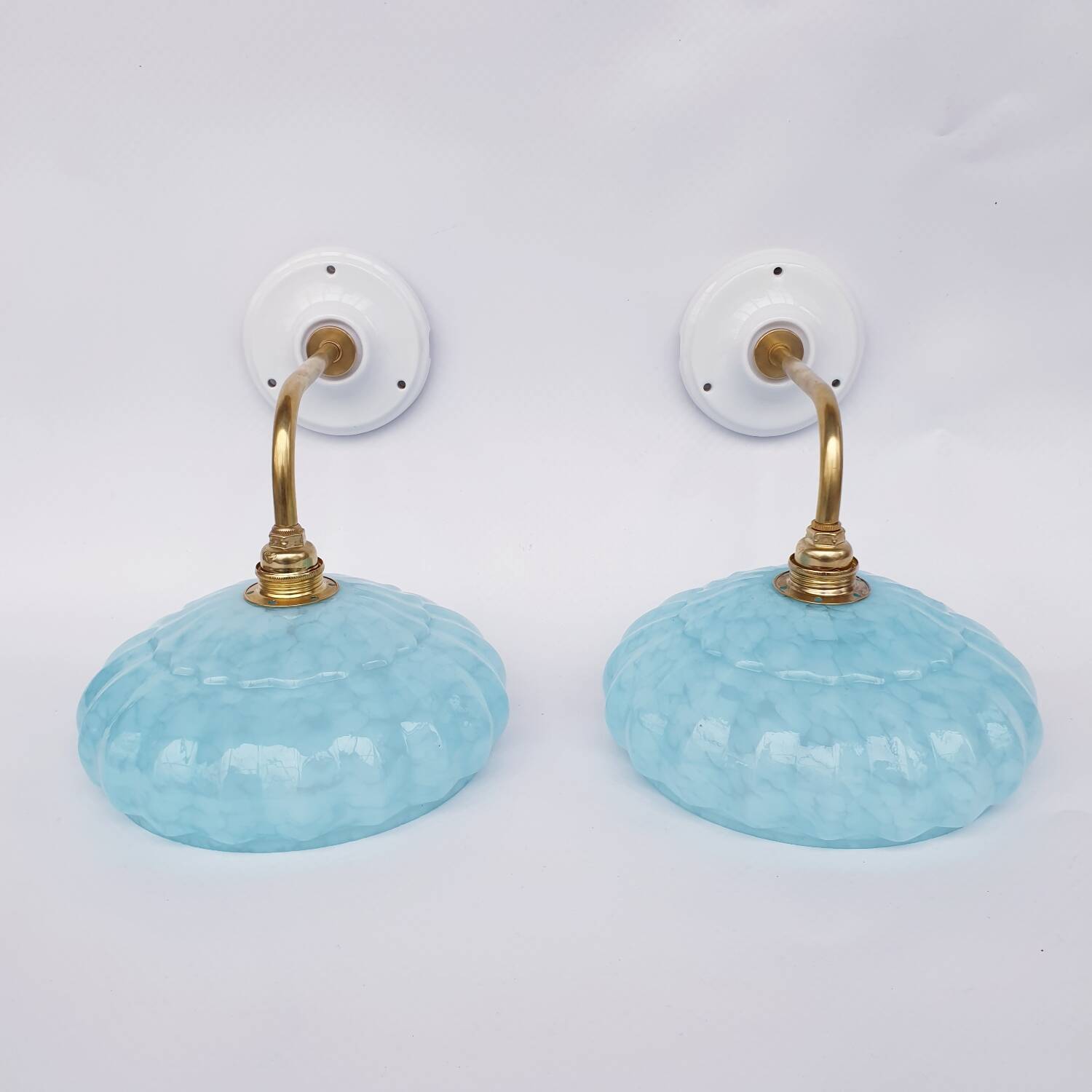 Swan neck wall lights and Clichy glass